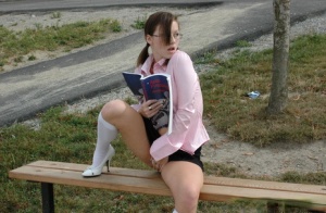 Horny schoolgirl Kate spreading in white panties  socks to masturbate outside