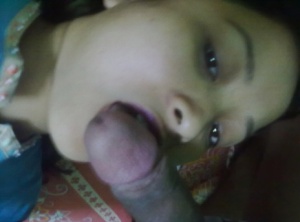 Indian wife changes attire while pleasuring her husband on bed POV style