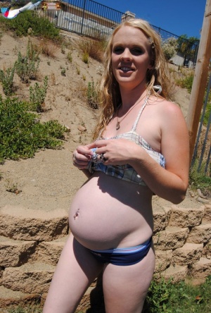 Pregnant girl Kristi launches her nude modelling career in her backyard