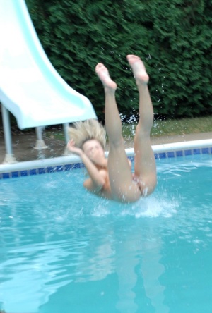 Blonde teen Kasia doffs bikini before water sliding in the nude