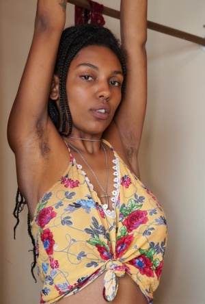 Ebony amateur Sofia Cuty flaunts her big naturals and full bush in the nude