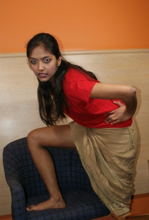 Indian solo model flashes her upskirt underwear while eating an orange