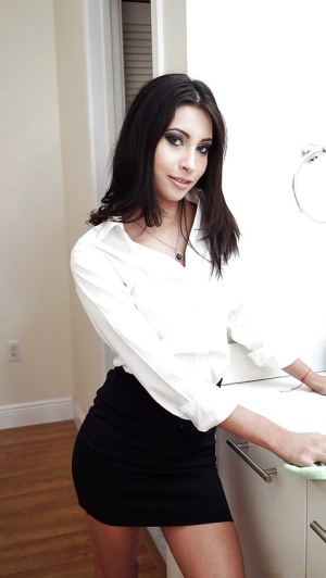 Brunette babe Jade Jantzen posing fully clothed in white blouse and skirt
