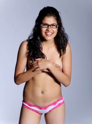 Indian solo girl strips to her sexy panties wearing glasses