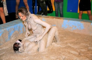 Seductive fetish gals with petite tits are into messy mud wrestling