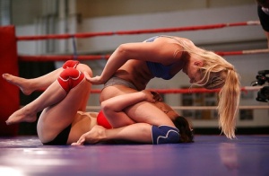 Seductive sporty chicks have some fun in the ring ending up with lesbian sex