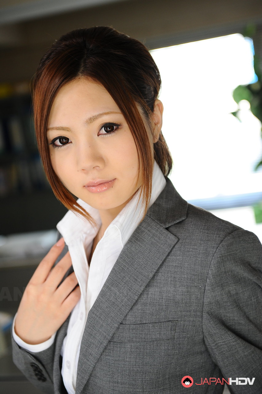 JAV Japanese businesswoman Iroha Kawashima bares her bra before donning glasses