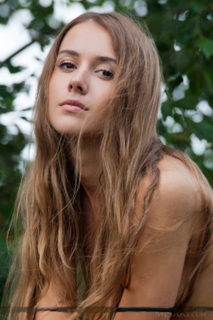 Skinny teen model Lina Diamond removes shorts to pose naked on picnic table