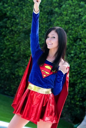 Brunette cosplay girl Catie Minx strips Superman costume by the pool 28435523