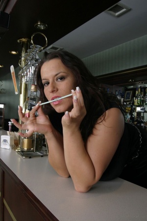 Brunette bartender Aneta Buena unleashes her huge tits while at work 54833259
