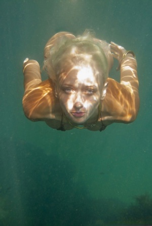 Ukrainian beauty Nika N swims underwater for nude posing inside a cave 87268156