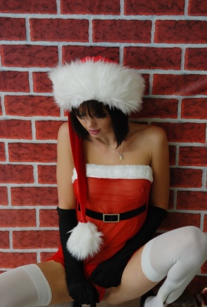 Diddy proves shes been naughty this year as she strips out of her sexy 15448182
