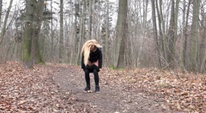 Blonde babe squatting to pee outside in the woods