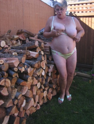 Brazen older granny strips off by the wood pile to show off BBW tits & big ass 70213770