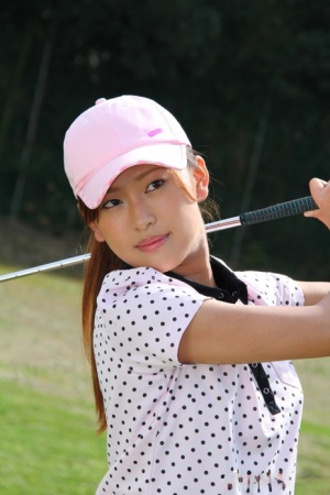 Young Japanese golfer Nao Yuzumiya flashes a no panty up skirt on the course 90190992