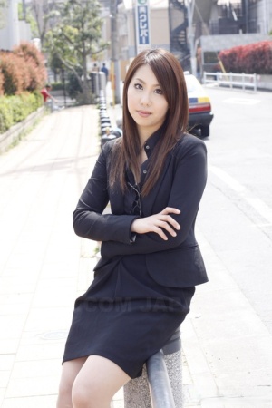 Japanese model Hikaru Matsu takes her glasses on and off in business clothing 94186843