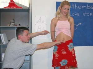 Young blonde is stripped naked before fondling a naked boy in a classroom 21193834