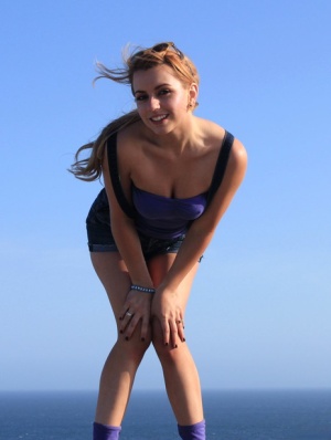 Solo girl Lexi Belle exposes her tits and ass while hiking near the ocean 38083186