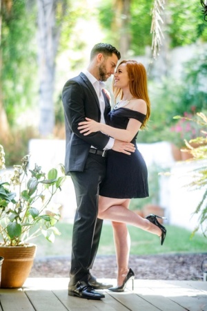 Pale redhead Ella Hughes seduces her man in a short black dress and heels 85916276