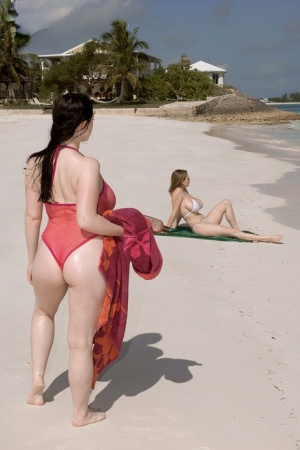 Big boobed lesbian Christy Marks seduces a busty female for sex on the beach 88406064
