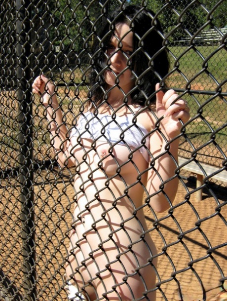 Dark haired teen exposes herself at a public ball diamond 34346829