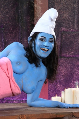 Latina chick Charley Chase shows off her girl parts in a Smurf outfit