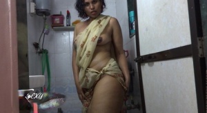 Plump Indian solo model Lily Singh lets her tits loose from her clothing 42948282