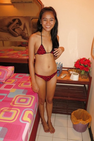 Petite Thai bar maid removing bikini to expose smooth pussy 28918049