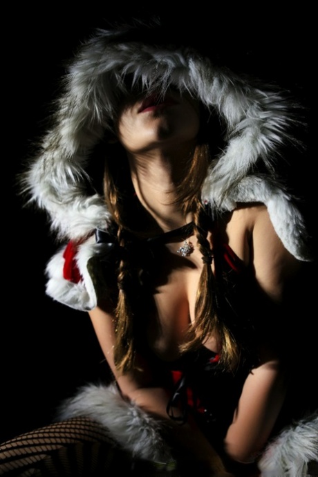 Erotic MILF pornstar Dani Daniels flaunts cleavage in sexy Xmas costume 24448003