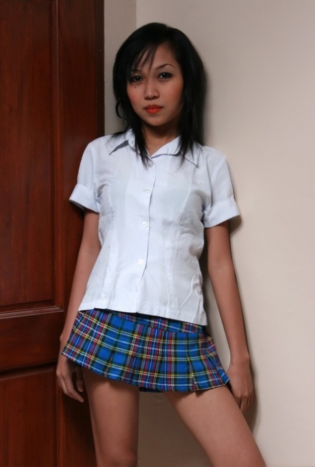 Asian schoolgirl stands naked up against the wall during her nude premiere 46117345