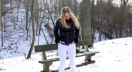 Solo girl Violette squats on a bench for a piss in the dead of winter 11371946