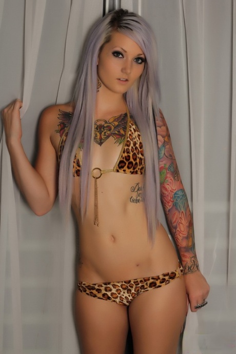 Alluring tattooed model in bikini teasing with her small breasts 40373405