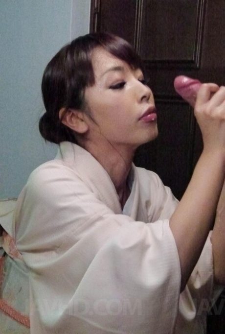 Japanese woman Marika licks jizz from a wrist to conclude a CFNM blowjob 22284452