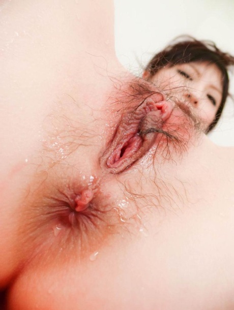 Japanese girl Rika Sonohara has her trimmed bush masturbated for her 20014998