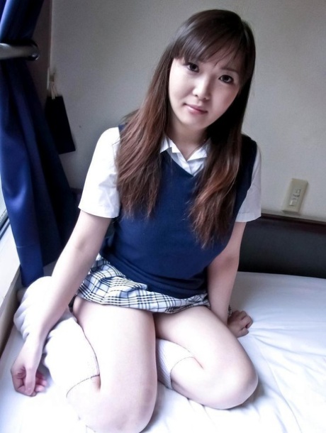 Japanese schoolgirl Haruka Ohsawa uncovers her fully developed breasts 39671275