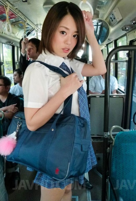 Japanese coed Yuna Satsuki is groped before sucking cock on a public bus 74772978