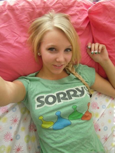 Cute blonde teen snaps self shots of her bare boobs in cutoff jean shorts 82870829