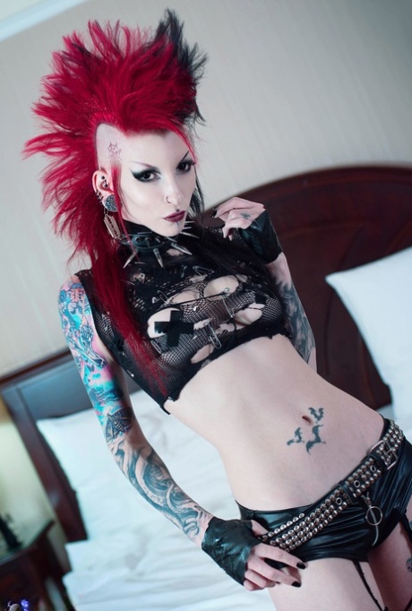 Tattooed punk Razor Candi sports a mohawk while showing her bald pussy 58382248