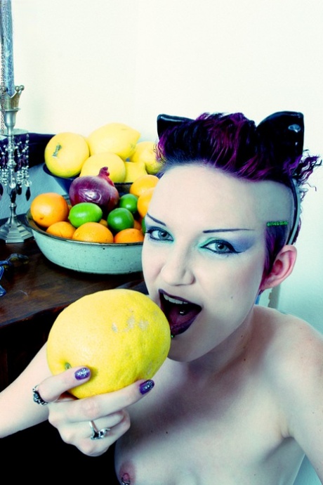 Goth girl Scar 13 licks an orange and a lemon while naked in footwear 71008616