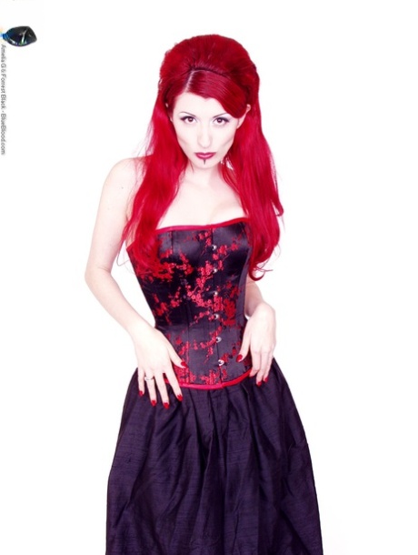 Goth girl Yolanda takes off her long skirt while wearing a corset and heels 90600846