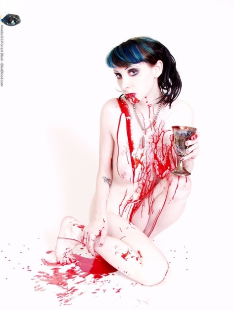 Naked goth girl Stephanie Slaughter drinks blood from a silver chalice 94930230
