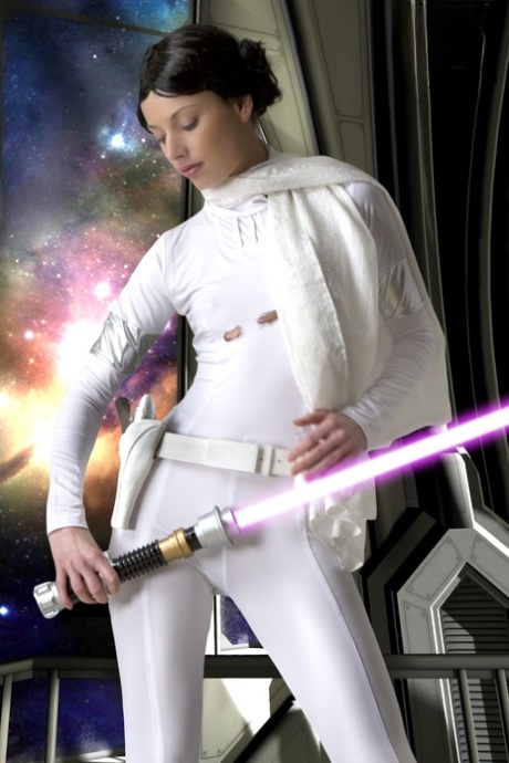 Living doll wields a lightsaber while emulating Princess Leah 13085268