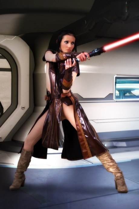 Hot girl wields a lightsaber before masturbating in cosplay clothing 98220409