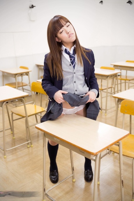 Japanese schoolgirl flashes cotton panties before taking them off in class 33056527