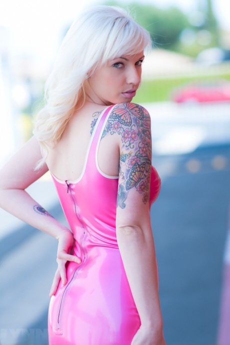 Amateur model Lynn Pops struts in parking lot wearing a pink latex dress 94986976