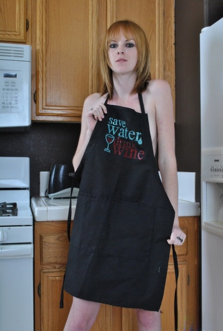 Redhead amateur Kate Cooper removes her kitchen apron to get totally naked 37160115