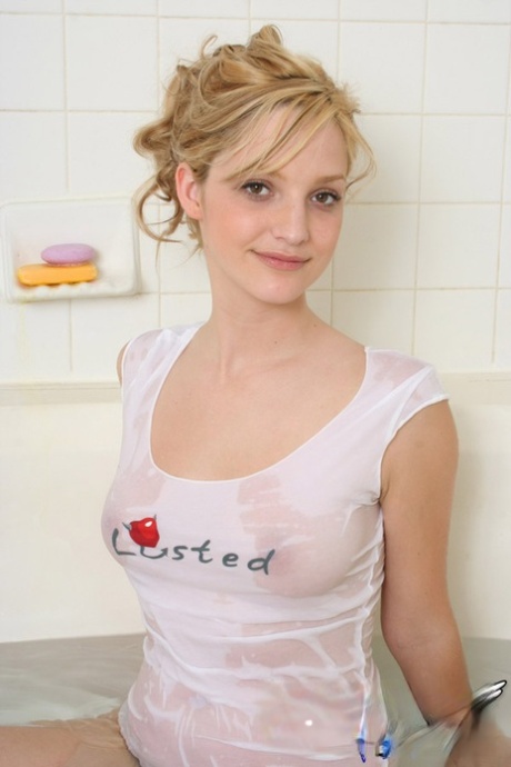 Amateur blonde cutie Marylin in wet white shirt bares big tits in the bath tub 81087365