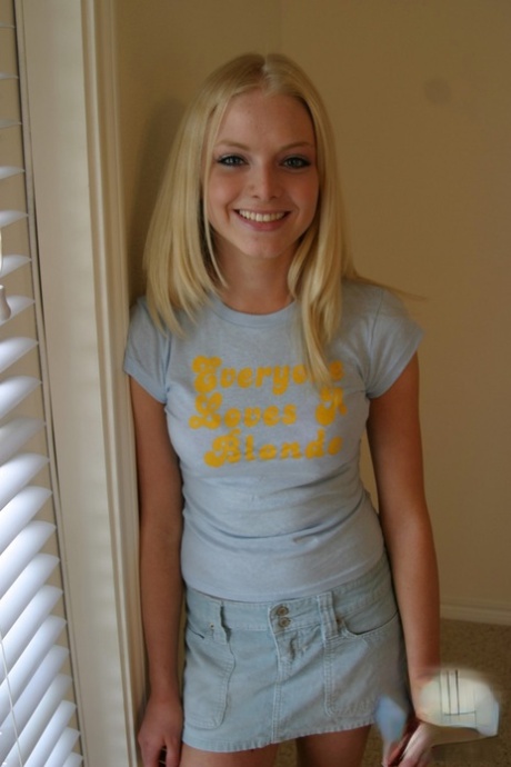 Blonde amateur Skye Model models by herself in a short skirt 34287210