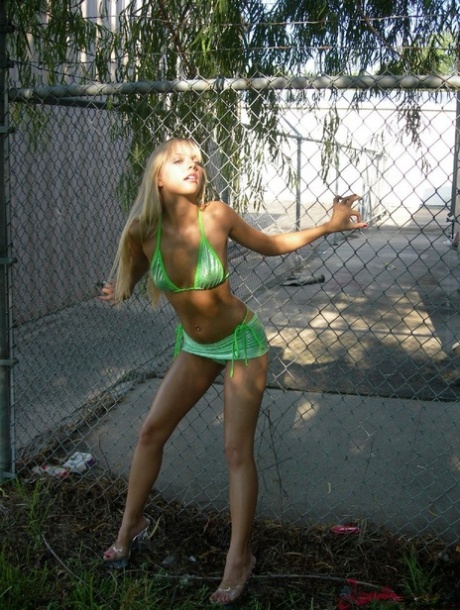 Blonde teen Jana Jordan models by herself in a few bikini combos 74312747