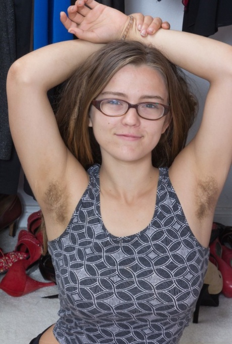 Glasses clad Pixxy is more than happy to show her young hairy armpits and muff 99078493